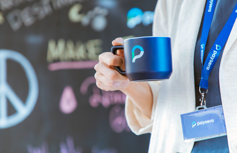 Paysera branded mug.